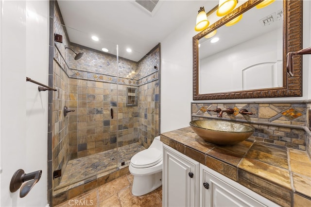 25811 Jamon Ln, Mission Viejo, CA 92691 - full bath featuring recessed lighting, a stall shower, vanity, tasteful backsplash, and stone finish floors