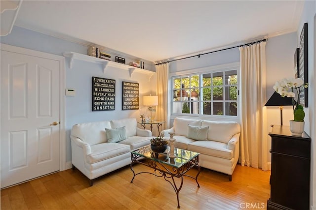 2136 W Gaucho Dr, Rancho Palos Verdes, CA 90275 - living room featuring light wood-style floors and ornamental molding
