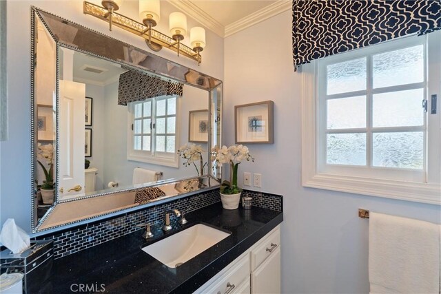 2136 W Gaucho Dr, Rancho Palos Verdes, CA 90275 - bathroom with crown molding, vanity, healthy amount of natural light, and toilet