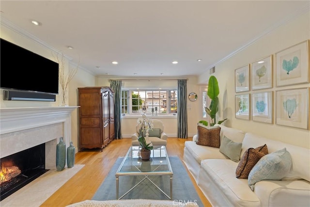 2136 W Gaucho Dr, Rancho Palos Verdes, CA 90275 - living room featuring a high end fireplace, wood finished floors, ornamental molding, recessed lighting, and baseboards