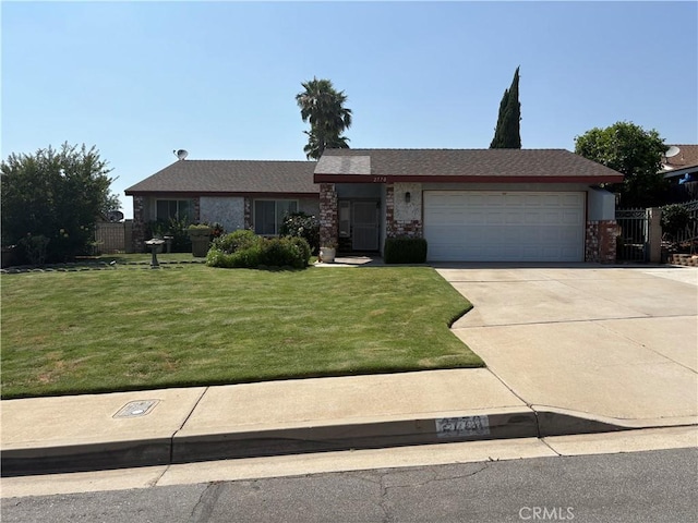 2770 Cole Ave, Highland, CA 92346 - view of front of property with a garage and concrete driveway