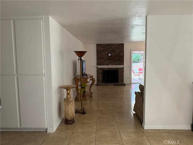 2770 Cole Ave, Highland, CA 92346 - hallway with light tile patterned floors and baseboards