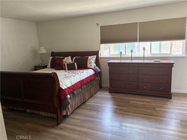 2770 Cole Ave, Highland, CA 92346 - bedroom with wood finished floors and baseboards