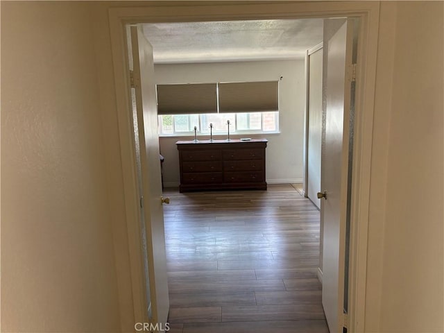 2770 Cole Ave, Highland, CA 92346 - hall featuring dark wood finished floors and baseboards