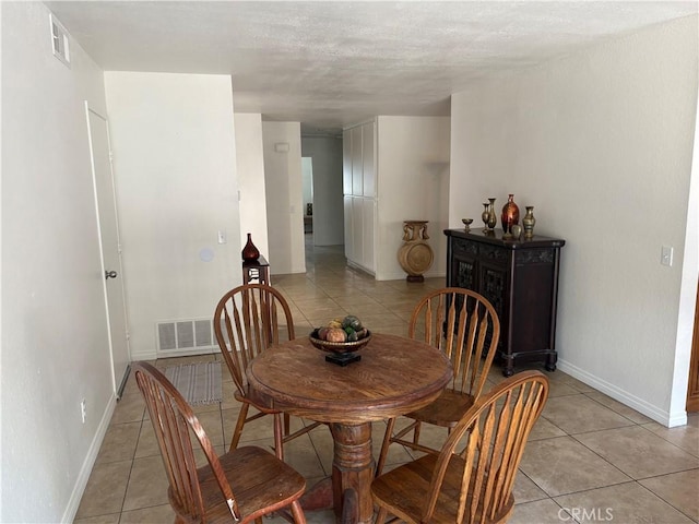 2770 Cole Ave, Highland, CA 92346 - dining room featuring light tile patterned floors and baseboards