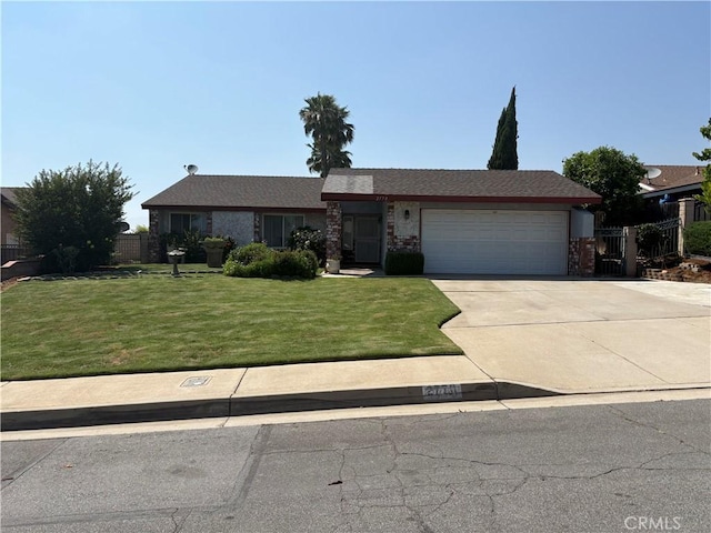 2770 Cole Ave, Highland, CA 92346 - view of front facade featuring a garage and driveway