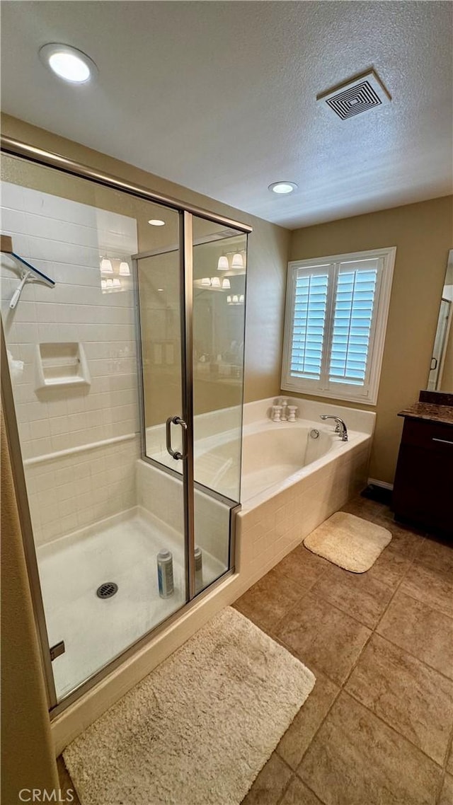1502 Beacon, Upland, CA 91786 - full bath featuring a garden tub, vanity, a stall shower, tile patterned flooring, and a textured ceiling