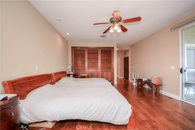 8140 Del Ct, Phelan, CA 92371 - bedroom with wood finished floors, multiple windows, ceiling fan, and baseboards