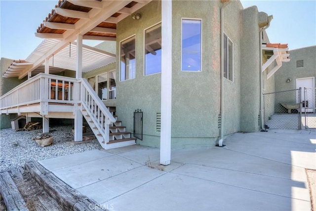8140 Del Ct, Phelan, CA 92371 - view of patio featuring stairs and a gate