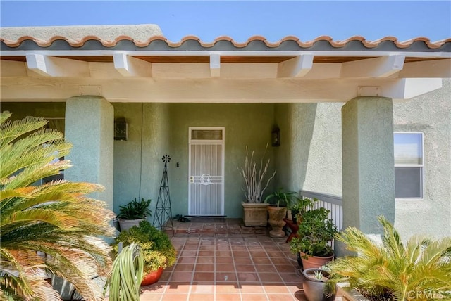 8140 Del Ct, Phelan, CA 92371 - doorway to property featuring stucco siding
