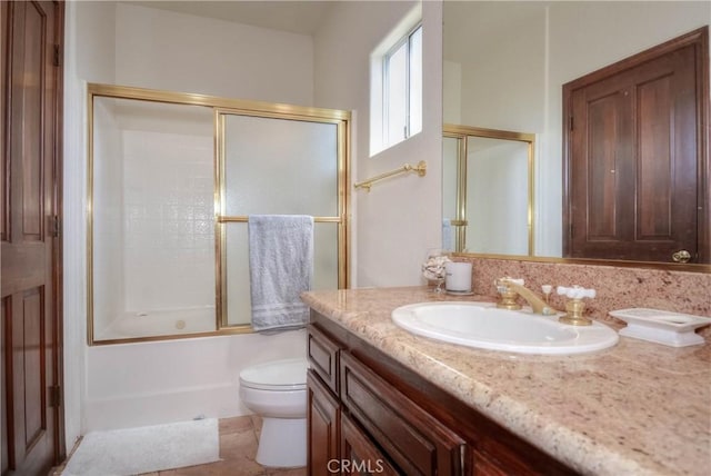 8140 Del Ct, Phelan, CA 92371 - full bath featuring vanity, toilet, and shower / bath combination with glass door