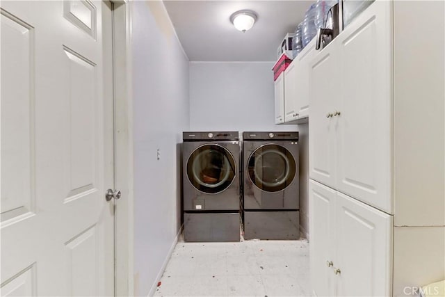 12642 Gorham St, Moreno Valley, CA 92553 - laundry area with independent washer and dryer, cabinet space, and light flooring