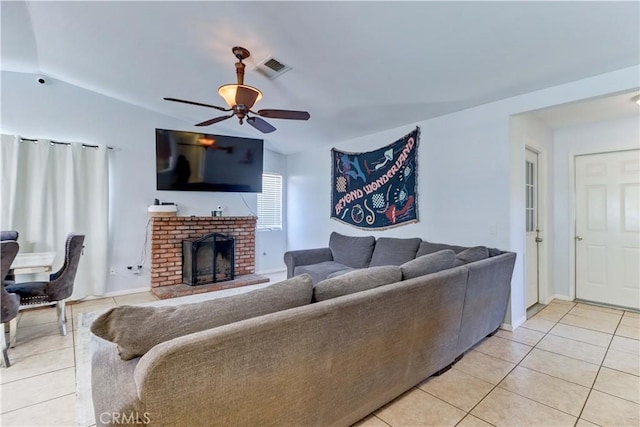 12642 Gorham St, Moreno Valley, CA 92553 - living area featuring a ceiling fan, light tile patterned floors, a fireplace, and lofted ceiling