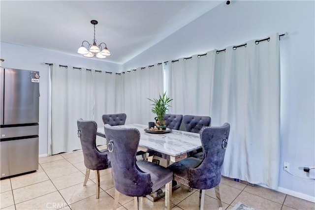 12642 Gorham St, Moreno Valley, CA 92553 - dining space featuring lofted ceiling, light tile patterned floors, and a chandelier
