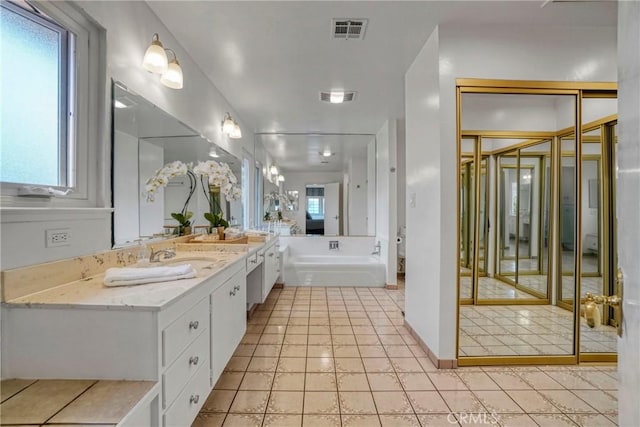 27990 Beechgate Dr, Rancho Palos Verdes, CA 90275 - bathroom featuring double vanity, plenty of natural light, and tile patterned flooring