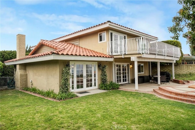 27990 Beechgate Dr, Rancho Palos Verdes, CA 90275 - rear view of house featuring french doors, stucco siding, a balcony, a chimney, and a tiled roof