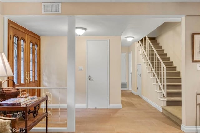 27990 Beechgate Dr, Rancho Palos Verdes, CA 90275 - foyer featuring light wood-style floors, stairs, and baseboards