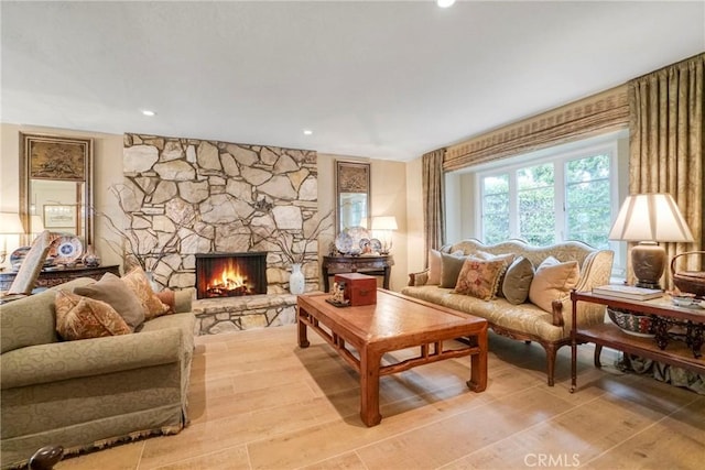27990 Beechgate Dr, Rancho Palos Verdes, CA 90275 - living area featuring a stone fireplace, light wood finished floors, and recessed lighting