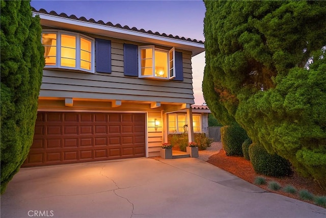 27990 Beechgate Dr, Rancho Palos Verdes, CA 90275 - view of front of property with a garage, concrete driveway, and a tiled roof