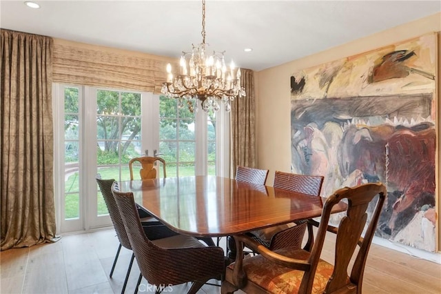 27990 Beechgate Dr, Rancho Palos Verdes, CA 90275 - dining room with healthy amount of natural light, a chandelier, light wood finished floors, recessed lighting, and french doors