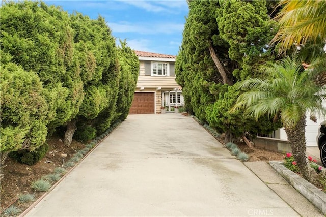 27990 Beechgate Dr, Rancho Palos Verdes, CA 90275 - obstructed view of property with concrete driveway and a garage