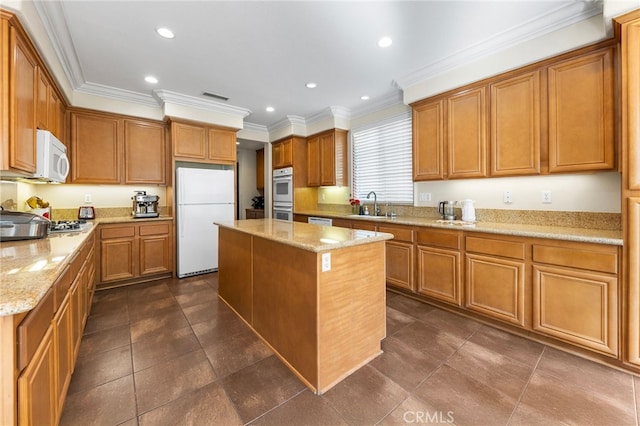 16848 Morning Glory Ct, Chino Hills, CA 91709 - kitchen with white appliances, a sink, light stone countertops, a center island, and crown molding