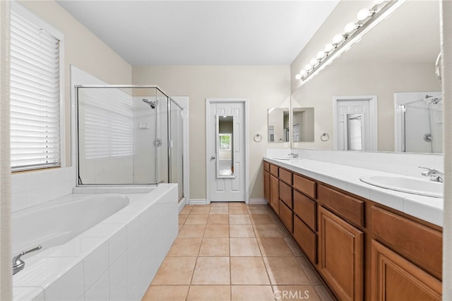 16848 Morning Glory Ct, Chino Hills, CA 91709 - bathroom with a stall shower, a bath, double vanity, tile patterned flooring, and baseboards