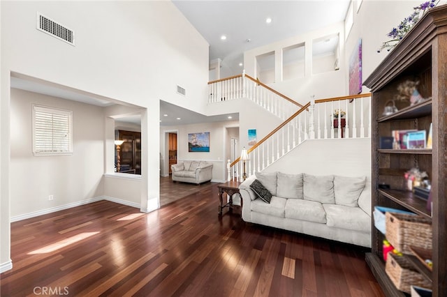 16848 Morning Glory Ct, Chino Hills, CA 91709 - living room with wood finished floors, a towering ceiling, stairs, baseboards, and recessed lighting