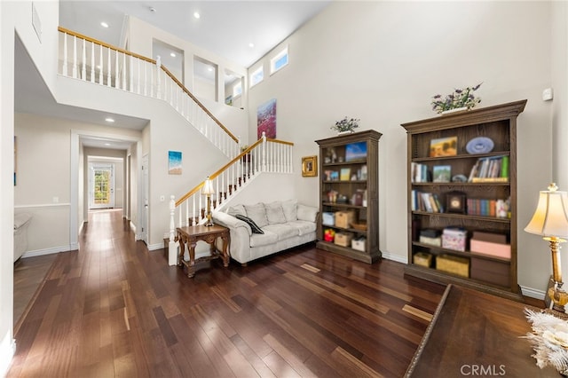 16848 Morning Glory Ct, Chino Hills, CA 91709 - living room featuring wood finished floors, stairs, a towering ceiling, baseboards, and recessed lighting