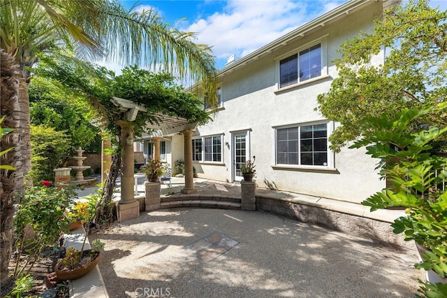 16848 Morning Glory Ct, Chino Hills, CA 91709 - rear view of property featuring stucco siding and a patio area