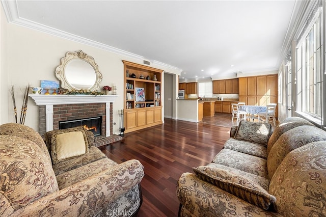 16848 Morning Glory Ct, Chino Hills, CA 91709 - living area featuring dark wood-style flooring, crown molding, a fireplace, baseboards, and recessed lighting