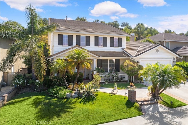 16848 Morning Glory Ct, Chino Hills, CA 91709 - view of front of house featuring a front yard, a tile roof, covered porch, and a garage