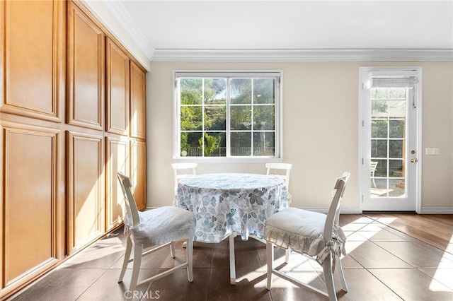 16848 Morning Glory Ct, Chino Hills, CA 91709 - dining space with crown molding, light tile patterned floors, and baseboards