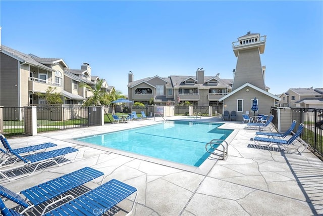1844 W Falmouth Ave Unit 5, Anaheim, CA 92801 - community pool featuring a residential view and a patio area