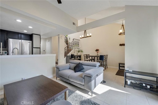 1844 W Falmouth Ave Unit 5, Anaheim, CA 92801 - living area featuring a chandelier, light tile patterned flooring, stairway, recessed lighting, and baseboards