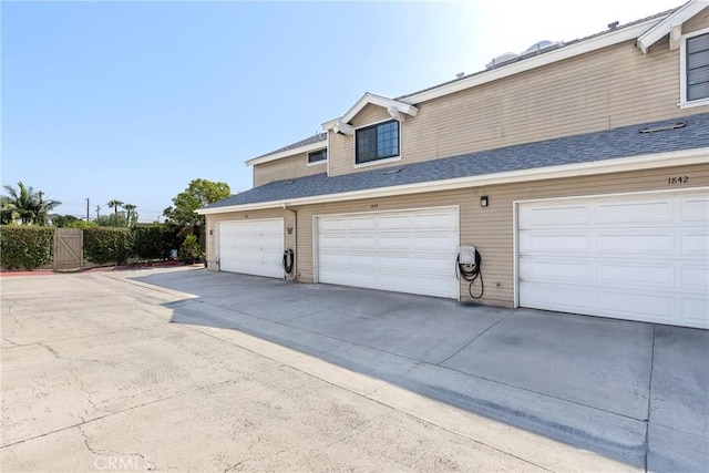 1844 W Falmouth Ave Unit 5, Anaheim, CA 92801 - garage featuring concrete driveway