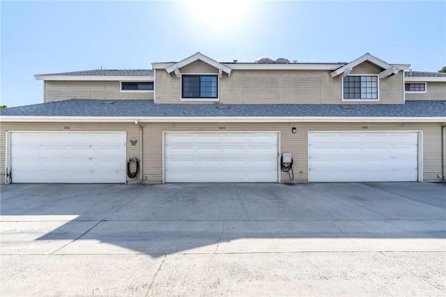 1844 W Falmouth Ave Unit 5, Anaheim, CA 92801 - garage featuring concrete driveway