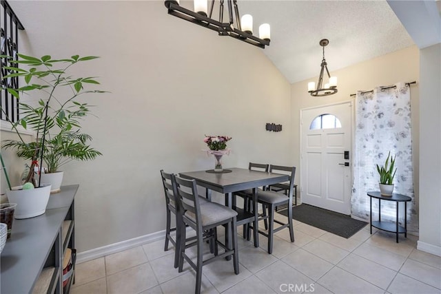 1844 W Falmouth Ave Unit 5, Anaheim, CA 92801 - foyer entrance featuring a chandelier, vaulted ceiling, light tile patterned flooring, and baseboards