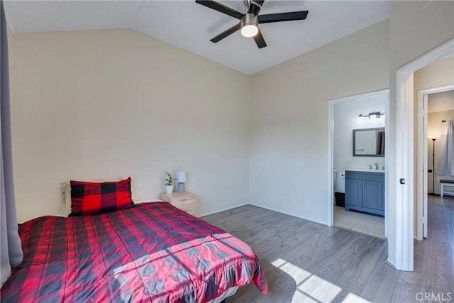 1844 W Falmouth Ave Unit 5, Anaheim, CA 92801 - bedroom with wood finished floors, vaulted ceiling, connected bathroom, and a ceiling fan