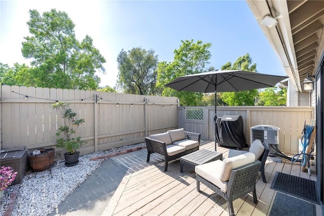 1844 W Falmouth Ave Unit 5, Anaheim, CA 92801 - deck featuring an outdoor living space, central air condition unit, a fenced backyard, and area for grilling