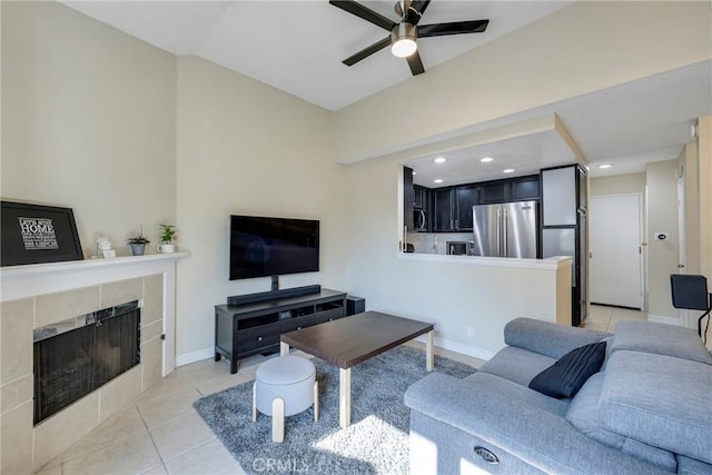 1844 W Falmouth Ave Unit 5, Anaheim, CA 92801 - living area featuring ceiling fan, a fireplace, light tile patterned floors, baseboards, and recessed lighting