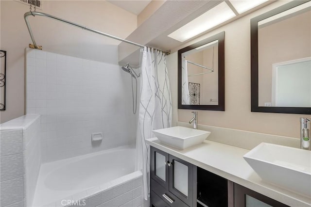 1844 W Falmouth Ave Unit 5, Anaheim, CA 92801 - bathroom with shower / bath combo with shower curtain and double vanity