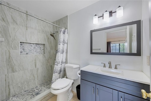 1844 W Falmouth Ave Unit 5, Anaheim, CA 92801 - bathroom featuring toilet, vanity, and tiled shower