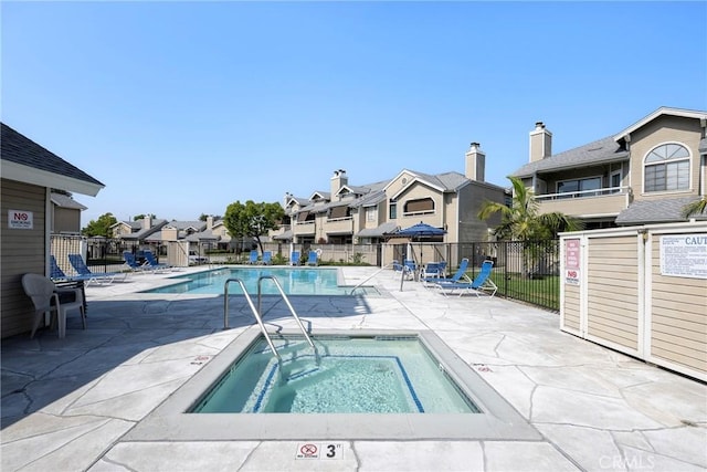 1844 W Falmouth Ave Unit 5, Anaheim, CA 92801 - community pool with a community hot tub, a residential view, and a patio area
