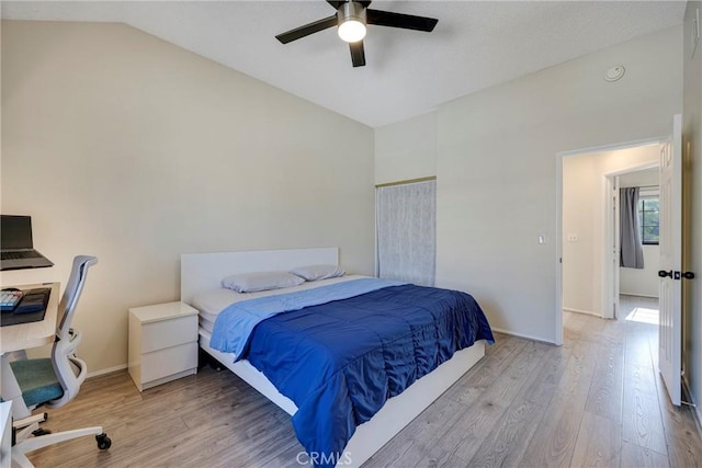1844 W Falmouth Ave Unit 5, Anaheim, CA 92801 - bedroom featuring light wood-type flooring, lofted ceiling, a desk, baseboards, and a ceiling fan