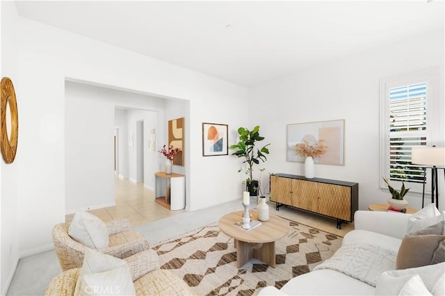 20010 Livorno Ln, Yorba Linda, CA 92886 - living area with healthy amount of natural light, light tile patterned floors, and baseboards