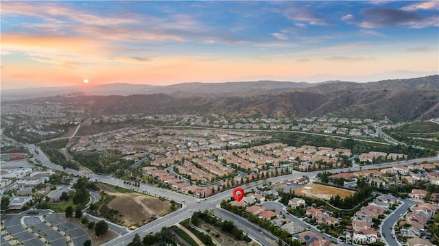 20010 Livorno Ln, Yorba Linda, CA 92886 - aerial view of property and surrounding area featuring nearby suburban area and a mountain backdrop