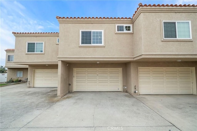 1845 Plaza Del Amo Unit C, Torrance, CA 90501 - multi unit property featuring an attached garage, stucco siding, and driveway