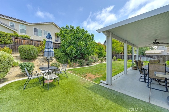28978 Williston Ct, Temecula, CA 92591 - fenced backyard featuring ceiling fan, outdoor dining space, and a patio