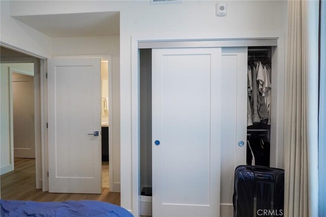 137 Saint Francis St Unit A, San Gabriel, CA 91776 - bedroom featuring a closet and wood finished floors